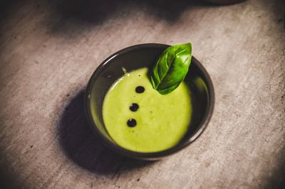 High angle view of green fruit on table