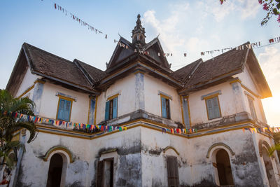 Low angle view of historic building against sky