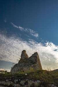 Low angle view of old building against sky