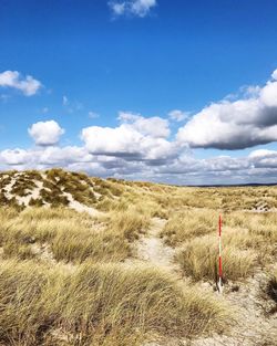 Scenic view of beach against sky