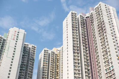 Low angle view of modern buildings against sky