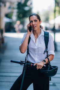 Young woman using mobile phone