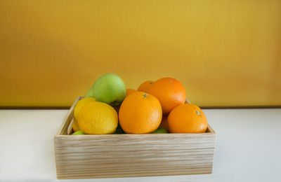 Close-up of orange fruits on table