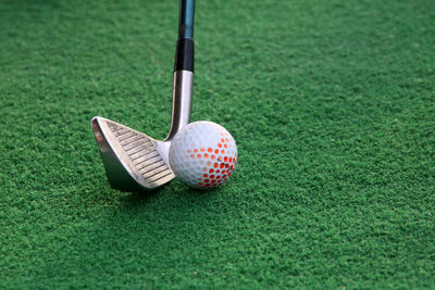 Close-up of ball on golf course