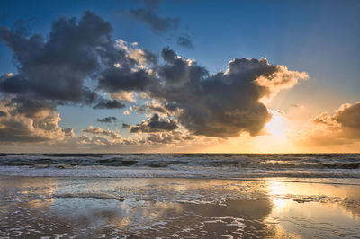 Scenic view of sea against sky during sunset