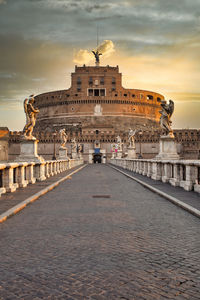 View of historical building against sky during sunset