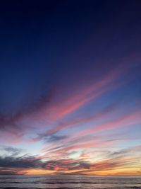 Low angle view of dramatic sky during sunset