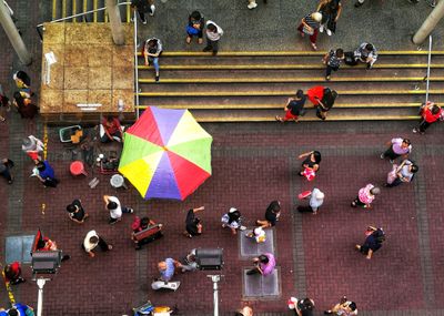High angle view of people walking on street