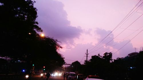 Silhouette trees against sky during sunset