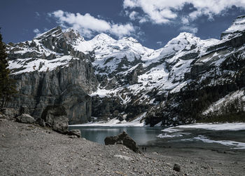 Scenic view of snowcapped mountains against sky