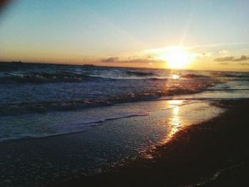 Scenic view of sea at sunset