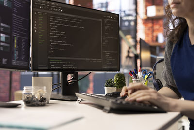 Businesswoman working on table