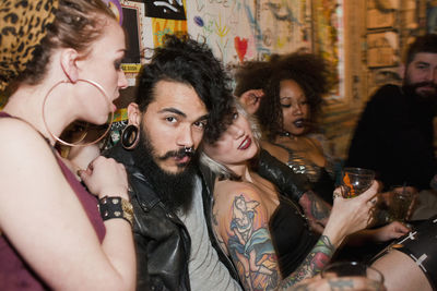 Group of people in drinking glass