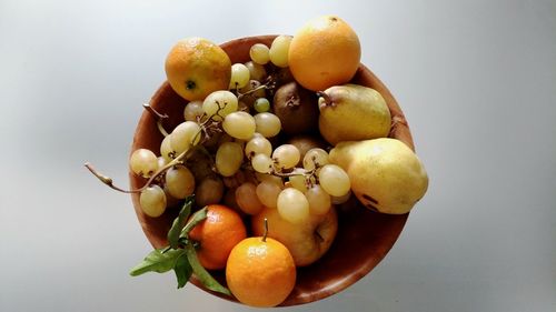 Close-up of fruits against white background