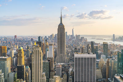 Modern buildings in city against sky