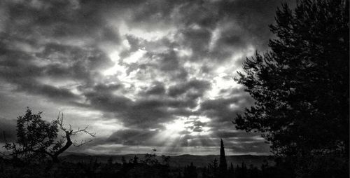 Scenic view of landscape against cloudy sky