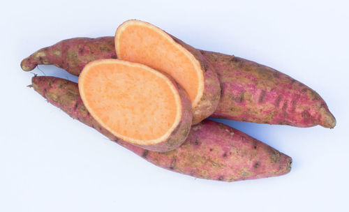 Close-up of bread against white background