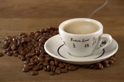 Close-up of coffee cup on table