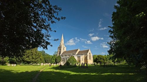 Low angle view of historic church against sky