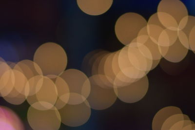 Defocused image of illuminated lights at night