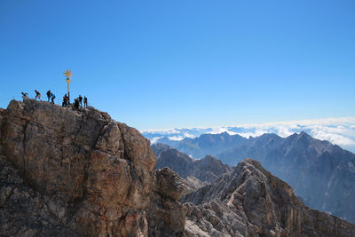 Scenic view of mountains against clear blue sky