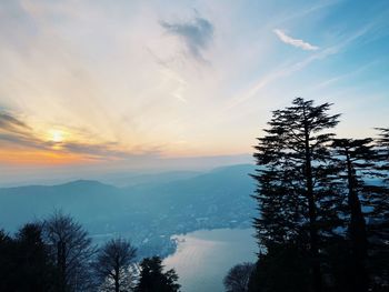 Scenic view of mountains against sky during sunset