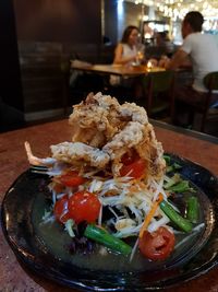 Close-up of served food in plate