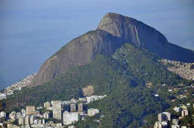 Houses on mountain range