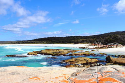 Scenic view of sea against blue sky