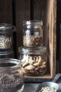 Close-up of food in glass jars on kitchen counter