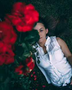 Portrait of woman with red roses