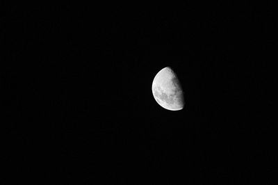 Low angle view of moon against sky at night