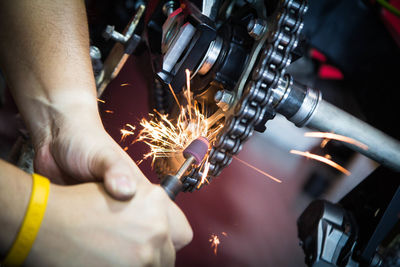 Blurred motion of man working at machine