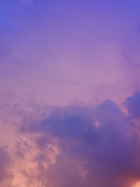 Low angle view of cloudy sky during sunset