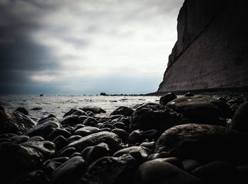 Scenic view of sea against cloudy sky