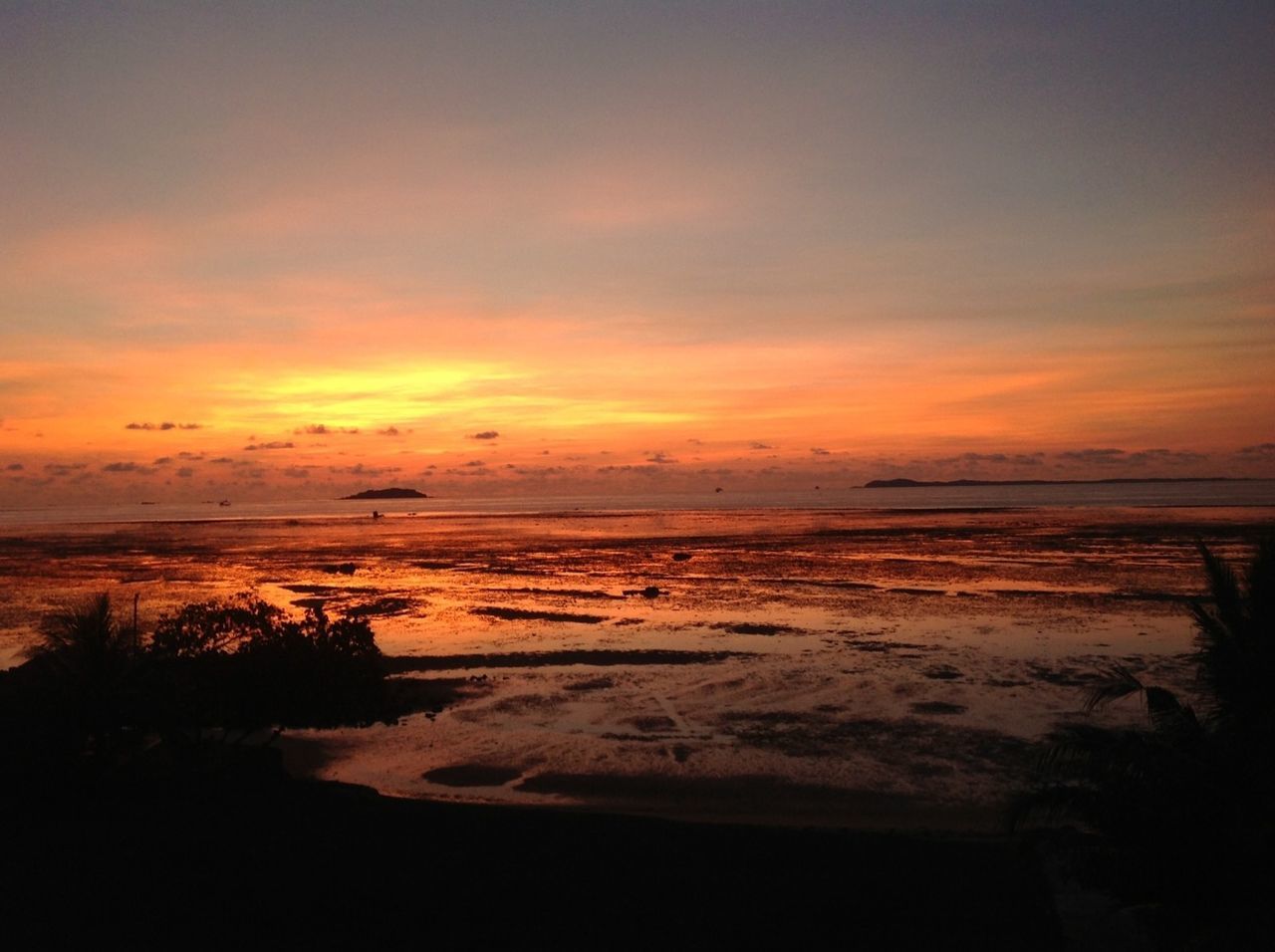 sunset, sea, water, horizon over water, beach, scenics, tranquil scene, beauty in nature, tranquility, shore, sky, nature, idyllic, orange color, cloud - sky, sand, wave, coastline, non-urban scene, dusk