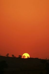 Scenic view of landscape at sunset