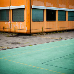 Swimming pool by building in city