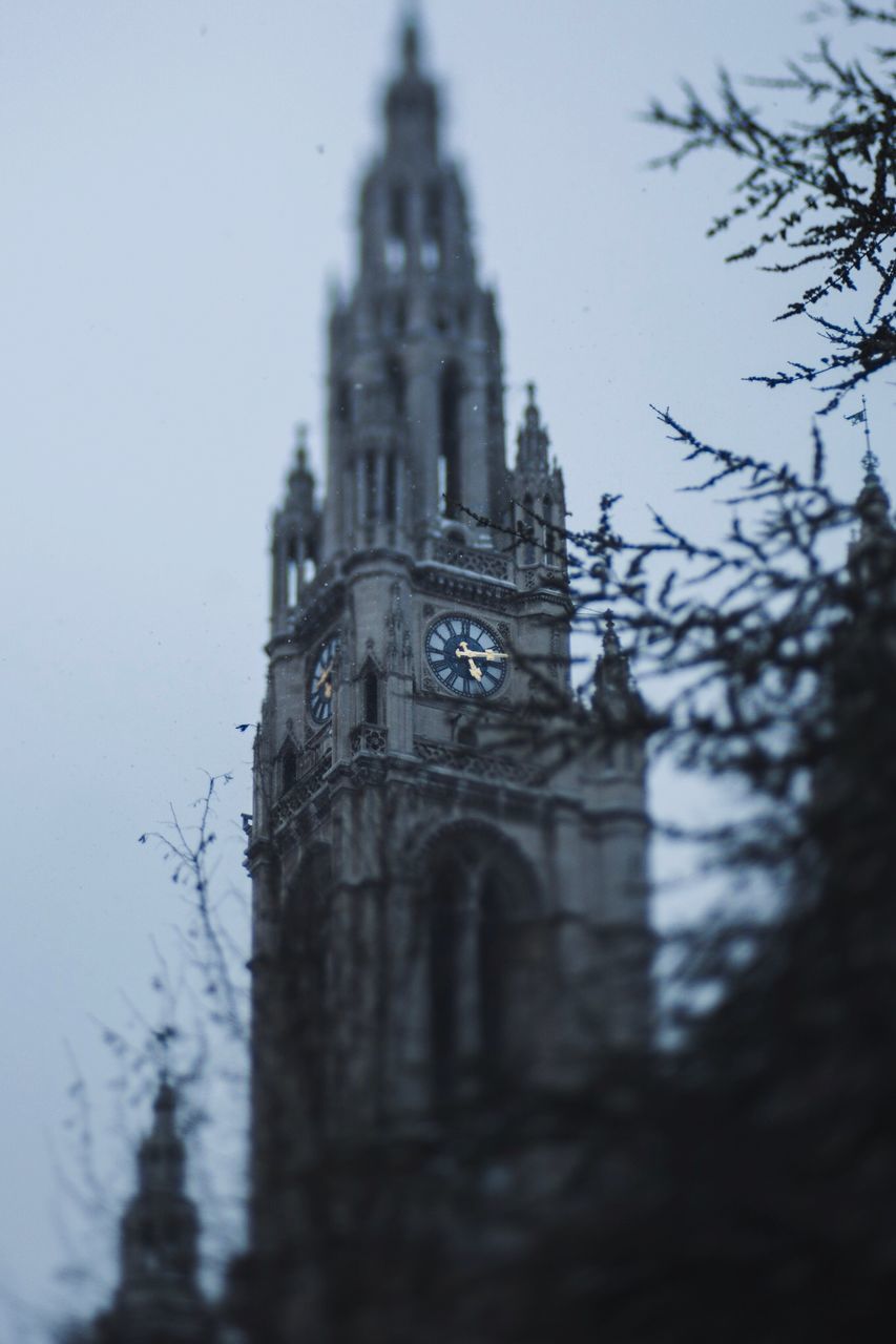 religion, place of worship, architecture, spirituality, built structure, building exterior, history, no people, day, travel destinations, sky, outdoors, clock tower, tree