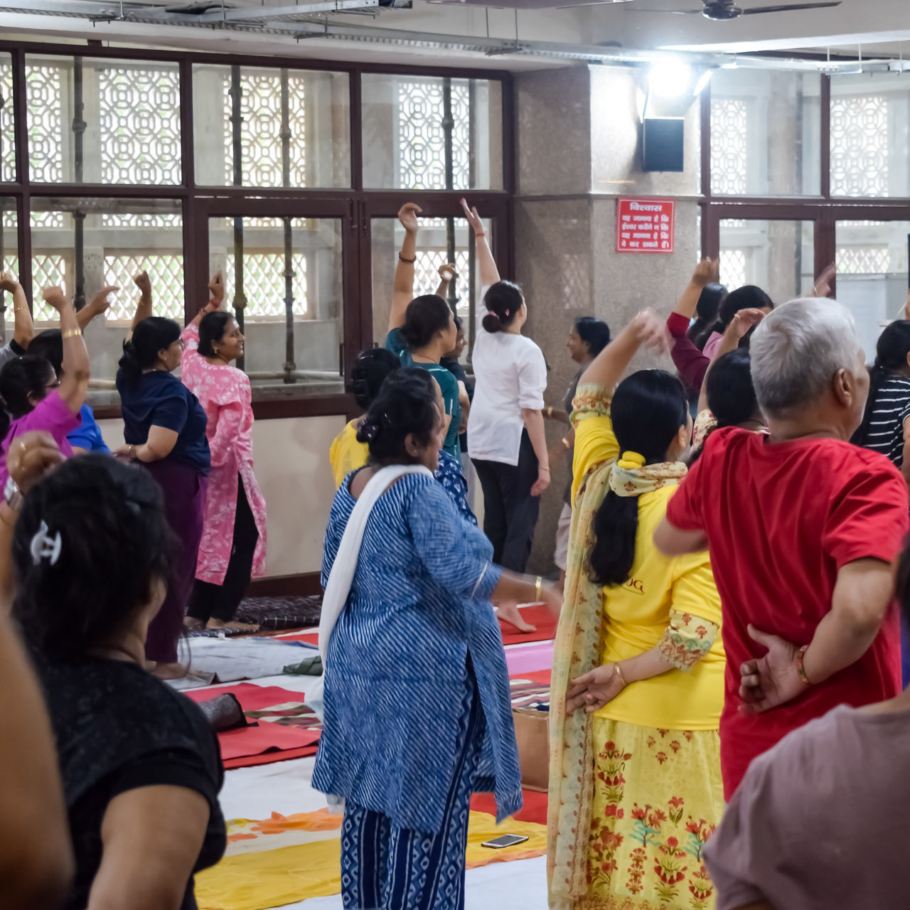 group of people, women, large group of people, crowd, men, adult, indoors, architecture, communication, clothing, person, togetherness, group, female