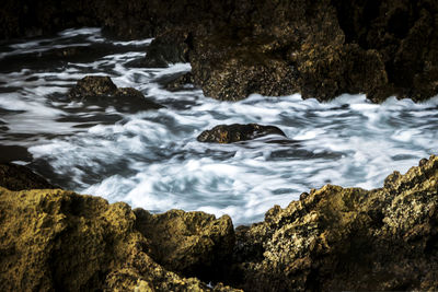 Scenic view of rocks in sea