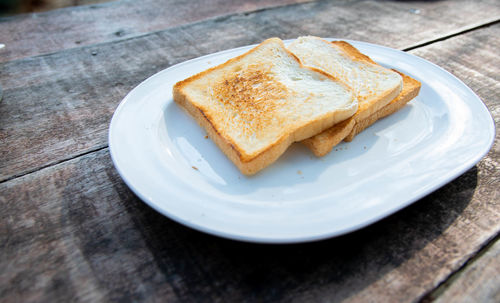 High angle view of bread in plate on table