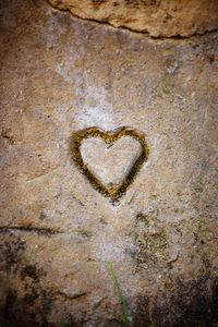 Close-up of heart shape on wall