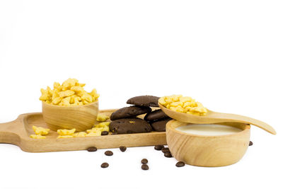 Close-up of yellow bread against white background