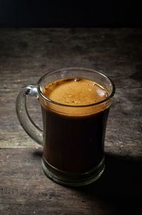Close-up of coffee cup on table