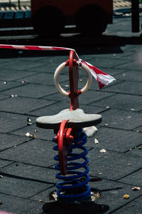 Close-up of shopping cart on street
