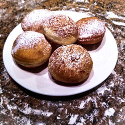 High angle view of cookies in plate on table