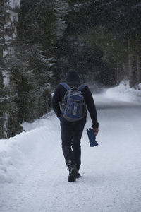 Trekking in the alps in a snowy white winter landscape