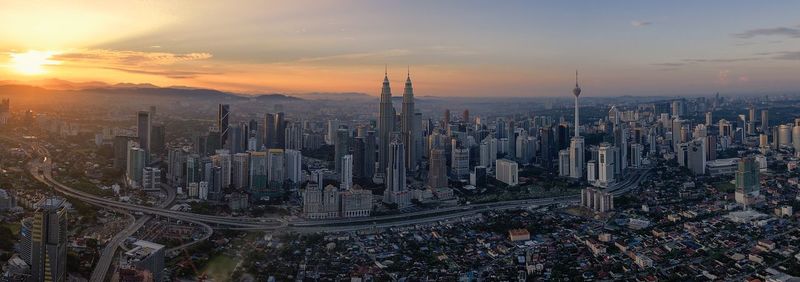 High angle view of cityscape during sunset