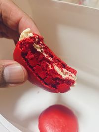 Close-up of hand holding ice cream